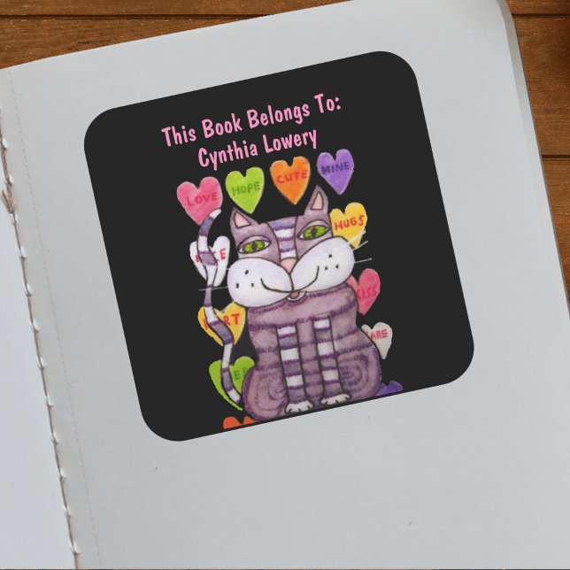 Purple Cat Green Eyes Candy Hearts With Sayings Square Sticker (Cute purple cat green eyes candy hearts with sayings on black book ownership label.)