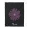 Purple daisy with glitter on black