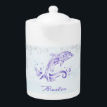 Purple Dolphin Personalized Teapot<br><div class="desc">Enjoy your tea with a Purple Dolphin Personalized Teapot.  Teapot design features a vibrant metallic dolphin against a muted seascape adorned elegant scrolls with an area to personalize with your name.  Additional gift items available with this design as well as a variety of colours.</div>