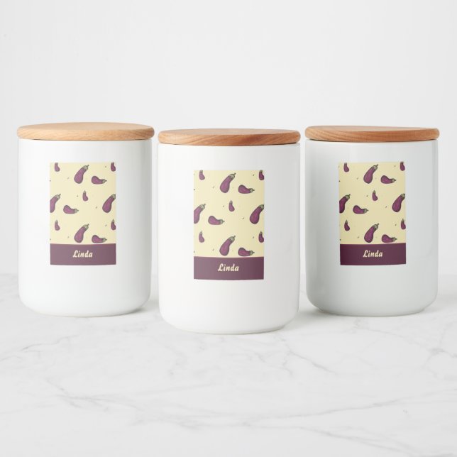 Purple eggplants on yellow food label (Bottles)