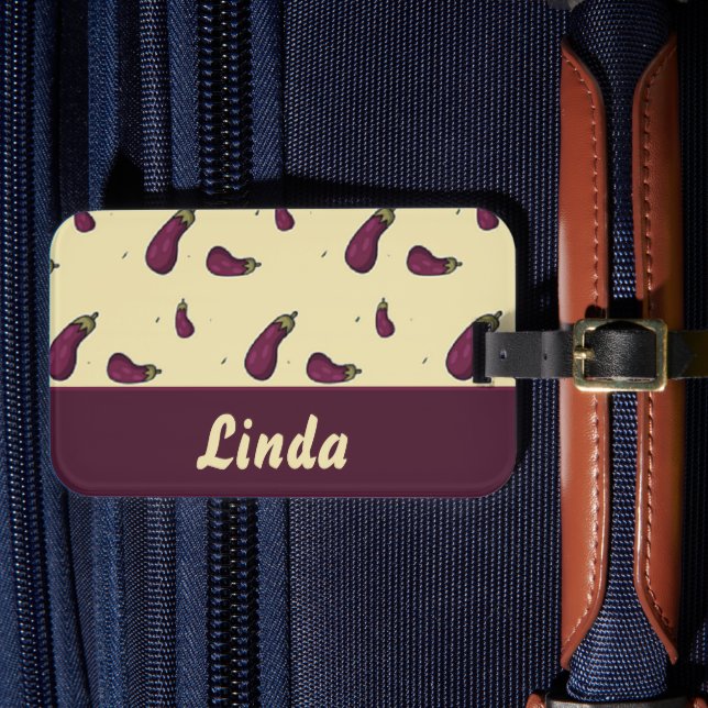 Purple eggplants on yellow luggage tag (Front Insitu 4)