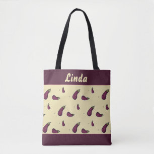Purple eggplants on yellow tote bag