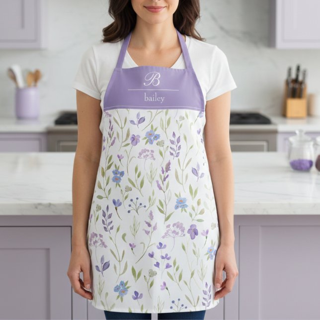 Purple Floral Monogram Apron (pretty purple blue wildflower floral apron with elegant monogram in script calligraphy)