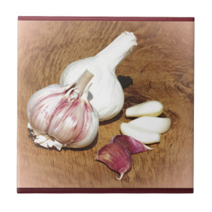 purple garlic on a oak board tile