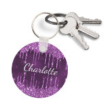 Purple glitter drips monogram initials name luxury keychain<br><div class="desc">A deep purple background decorated with faux glitter drips,  paint dripping look. The purple background colour is uneven. Personalize and add your name and monogram initials.  Purple and white coloured letters. The name is written with a modern hand lettered style script.</div>