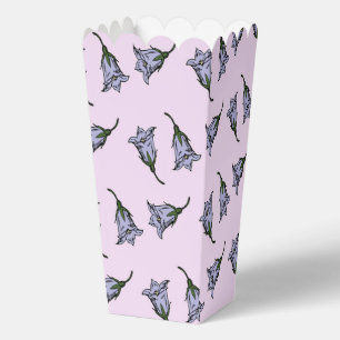 Purple harebell flower on pink favor box