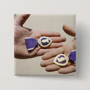 Purple Heart recipients display their medals 2 Inch Square Button