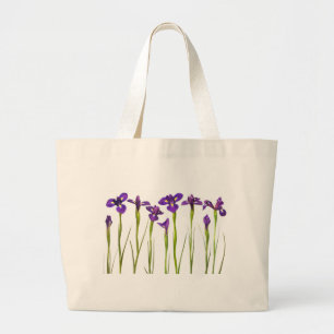 Purple irises isolated on a white background large tote bag