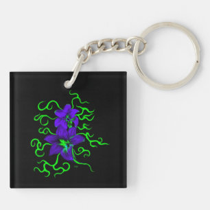 purple lily flower on black keychain
