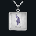 Purple Peacock Necklace<br><div class="desc">Personalize a unique gift for your bridesmaids with a Purple Peacock Necklace. Necklace design features a vibrant peacock resting on a delicate white foliage vine against a grunge background. Personalize with the bridesmaid's name for a cherished reminder of your big day. Additional wedding stationery available with this design as well....</div>