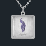 Purple Peacock Necklace<br><div class="desc">Personalize a unique gift for your bridesmaids with a Purple Peacock Necklace. Necklace design features a vibrant peacock resting on a delicate white foliage vine against a grunge background. Personalize with the bridesmaid's name for a cherished reminder of your big day. Additional wedding stationery available with this design as well....</div>