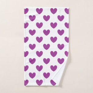 Purple polka hearts on white hand towel