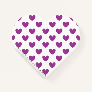 Purple polka hearts on white notebook