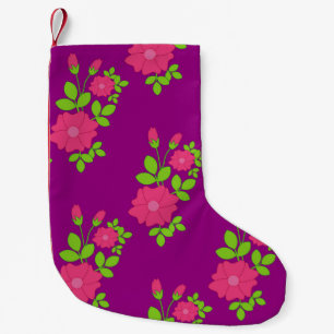 Purple seamless pattern with pink flowers and gree small christmas stocking