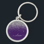 Purple Silver Glitter Girly Glam Monogram  Keychain<br><div class="desc">Silver and Purple Sparkle Glitter Script Monogram Name Keychains (Key Chain). This makes the perfect sweet 16 birthday,  wedding,  bridal shower,  anniversary,  baby shower or bachelorette party gift for someone that loves glam luxury and chic styles.</div>