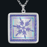 Purple Silver Glitter LOOK Snowflake Necklace<br><div class="desc">This festive FAUX (PRINTED) glitter snow flake necklace in colours of purple, turquoise, teal, aqua, and silver matches the winter wedding invitation shown below and would make a nice gift to to give to your your wedding party attendants like your Maid of Honour, Bridesmaids, and Flower Girl, or buy it...</div>