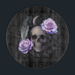 PURPLE SKULL CUTTING BOARD<br><div class="desc">Unleash your gothic spirit with this stunning skull design wrapped in roses, feathers, and celestial elements. A perfect fusion of boho and gothic aesthetics, this artwork features intricate linework and dreamy watercolor touches in purples, blacks, and silvers. Whether you're into edgy fashion or mystical vibes, this design makes a bold...</div>