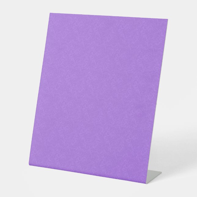 Purple textured surface with swirling pattern pedestal sign (Front)
