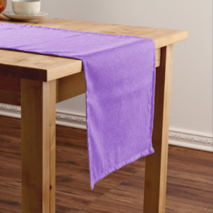 Purple textured surface with swirling pattern short table runner