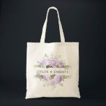 Purple White Floral Wedding Tote Bag<br><div class="desc">The wedding couple's names are surrounded by top and bottom borders of white hydrangea flowers and purple roses. There is a variety of leaves and branches that give it a very modern and chic vibe. This item is part of the Violette collection. I has templates you can use to create...</div>