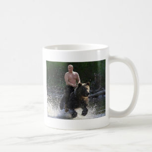 Putin rides a bear! coffee mug