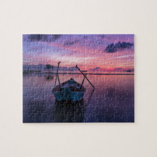 Puzzle Beau coucher de soleil de plage avec bateau à péda