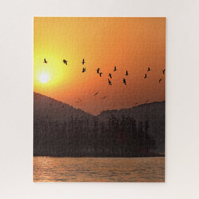 Puzzle Birds Flying dans le lac Est de Sunset Sky (Vertical)