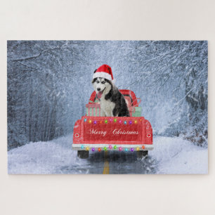 Puzzle Chien sibérien Husky en neige assis Camion de Noël