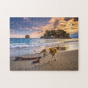 Puzzle Chien sur la plage au coucher du soleil