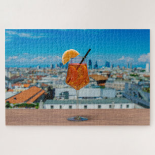 Puzzle Cocktail Spritz sur une table avec vue sur Milan