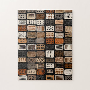 Puzzle conceptions de textiles en boue africaine dans une