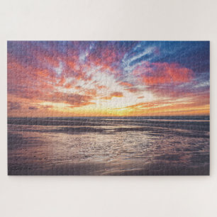 Puzzle Coucher de soleil sur la plage et la mer