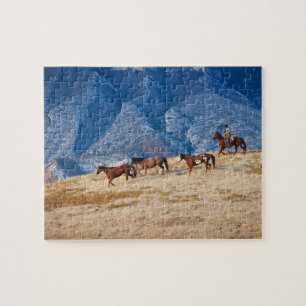 Puzzle Cowboy élevant des chevaux sauvages