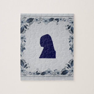 Puzzle Delft en tuile bleue fille avec une oreille perle