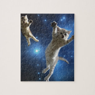 Puzzle Deux chats de l'espace flottant autour de la