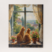 Deux chats roux regardant par la fenêtre