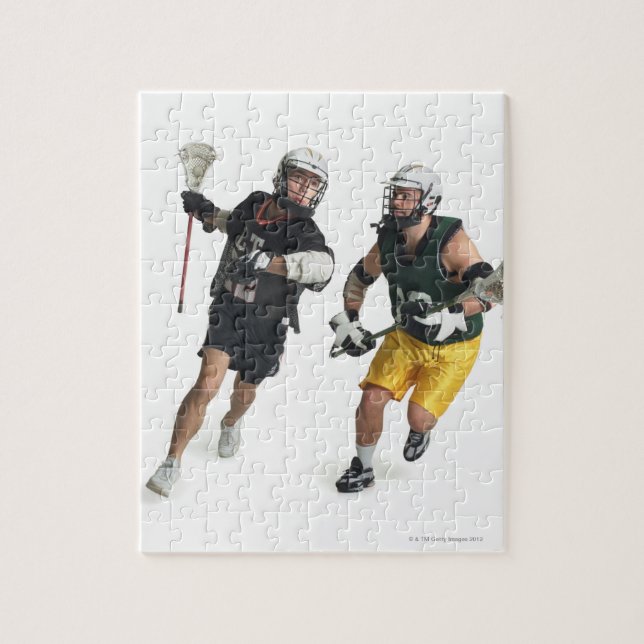 Puzzle deux joueurs de crosse masculin caucasiens de (Vertical)