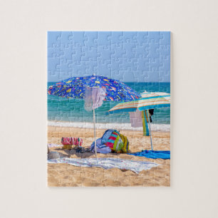 Puzzle Deux parasols et approvisionnements de plage à