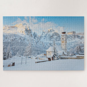 Puzzle Eglise couverte de neige avec arrière - plan de mo
