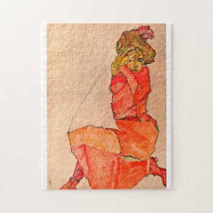 Puzzle Egon Schiele - Une femme agenouillée en robe rouge