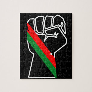 Puzzle fierté noire drapeau rouge vert poing panafricain