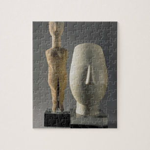 Puzzle (Figurine de Lto R) avec les bras croisés,