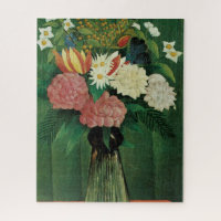 Fleurs dans un vase vert