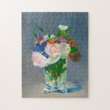 Fleurs de manet dans un vase de cristal