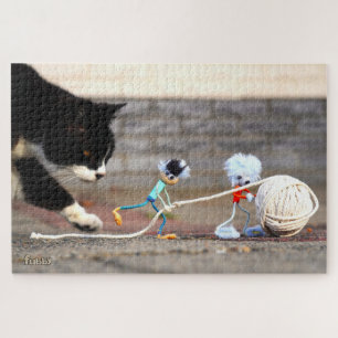 Puzzle Fubby joue avec une pelote de ficelle et Poes Ping