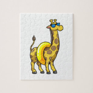 Puzzle Girafe sur la plage avec anneau de natation et lun