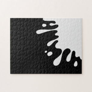 Puzzle Gravité de peinture blanche sur noir