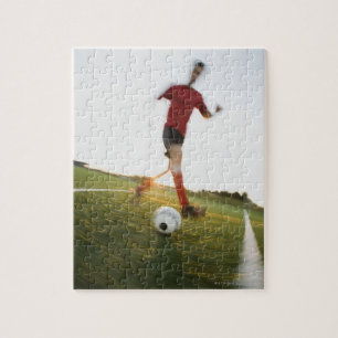 Puzzle Joueur de soccer boule à dribbler