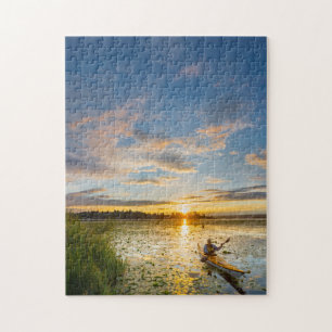 Puzzle Kayakiste masculin pagayant un kayak de mer sur ea