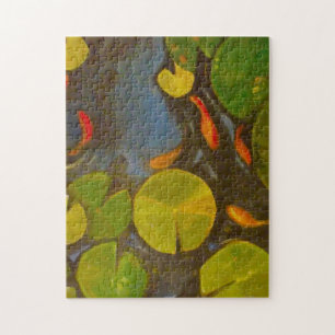 Puzzle Koi de petit poisson rouge dans l'étang avec Lily